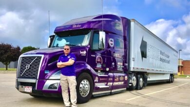 Joel Morrow with his Purple Haze Volvo