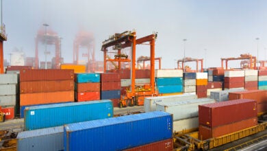 Images show containers, cranes and intermodal well cars at the Port of Vancouver's Centerm terminal.