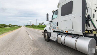 A Lineage tractor on a highway