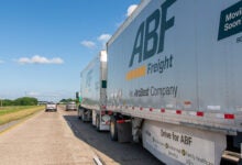 A tractor pulling two ABF Freight pup trailers on a highway