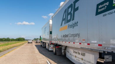 A tractor pulling two ABF Freight pup trailers on a highway