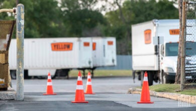 Orange cones blocking the entrance to a Yellow terminal in Houston days after the company shut down