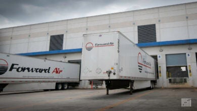 Two Forward Air trailers at a terminal