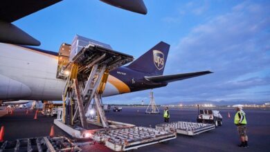 Close up of tail end of UPS cargo jet being loaded from rear door.